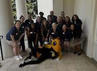 GTAAN Best Practices planning committee pose with Buzz.